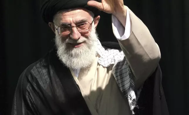 FILE — Iran's supreme leader Ayatollah Ali Khamenei waves as he attends the 18th anniversary of the death of Iran's late leader Ayatollah Ruhollah Khomeini, the founder of the Islamic revolution in Tehran, June 4, 2007. (AP Photo/Hasan Sarbakhshian, File)