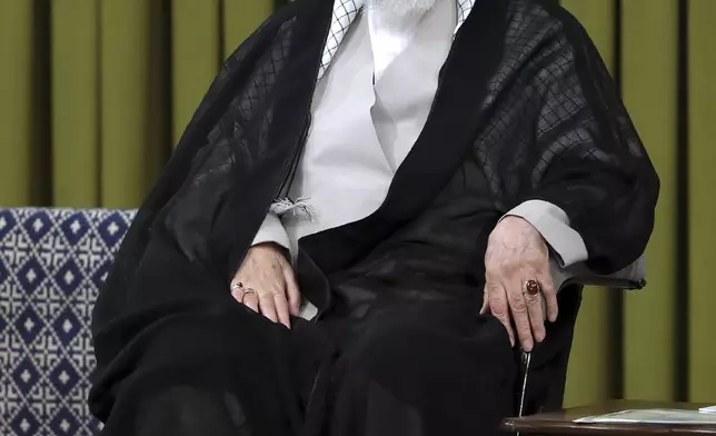 FILE — In this photo released by an official website of the office of the Iranian supreme leader, Supreme Leader Ayatollah Ali Khamenei attends a meeting commemorating Prophet Muhammad's birthday anniversary in Tehran, Iran, Sept. 21, 2024. (Office of the Iranian Supreme Leader via AP, File)