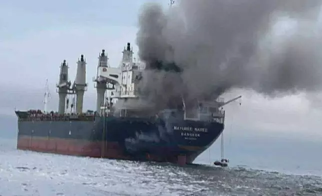 This image released by the Royal Thai Navy shows Thai cargo ship, Mayuree Naree, that was struck and set ablaze in the Strait of Hormuz Wednesday, March 11, 2026. (Royal Thai Navy via AP)