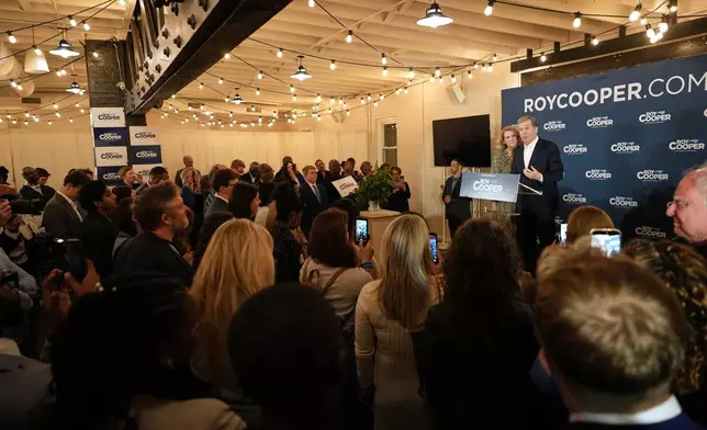 North Carolina Democratic Senate candidate former Gov. Roy Cooper speaks at a primary election night watch party Tuesday, March 3, 2026, in Raleigh, N.C. (AP Photo/Matt Ramey)