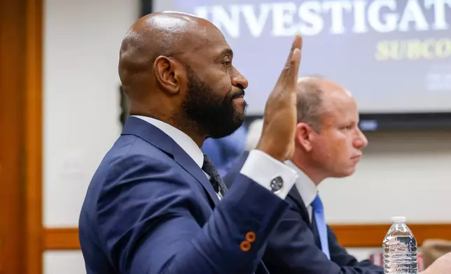 Former Fulton County special prosecutor Nathan Wade is sworn in for his testimony at a Senate Special Committee on Investigations Subcommittee hearing at the Capitol in Atlanta, Friday, March 13, 2026. (Arvin Temkar/Atlanta Journal-Constitution via AP)