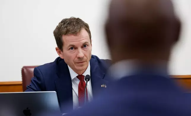 State Sen. Greg Dolezal, who is running for lieutenant governor, questions former Fulton County special prosecutor Nathan Wade at a Senate Special Committee on Investigations Subcommittee hearing at the Capitol in Atlanta, Friday, March 13, 2026. (Arvin Temkar/Atlanta Journal-Constitution via AP)