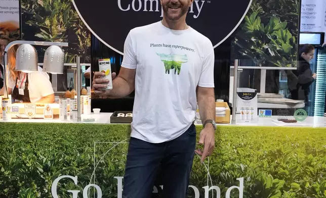 Beyond CEO Ethan Brown, the company's founder, poses for a photo at his Beyond booth as the company is transitioning from Beyond Meat to just Beyond, to introduce a new line of sparkling plant‑protein drinks at the Natural Products Expo West 2026 at the Anaheim Convention Center in Anaheim, Calif., on Thursday, March 5, 2026. (AP Photo/Damian Dovarganes)