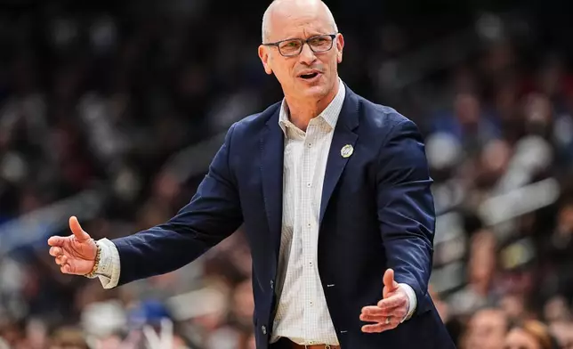 UConn head coach Dan Hurley reacts during the first half against Michigan State in the Sweet 16 of the NCAA college basketball tournament, Friday, March 27, 2026, in Washington. (AP Photo/Abbie Parr)