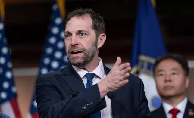 Rep. Jason Crow, D-Colo., a combat veteran, joins the House Democratic leadership in demanding a congressional approval for embarking on a war with Iran, during a news conference at the Capitol in Washington, Wednesday, March 4, 2026. (AP Photo/J. Scott Applewhite)