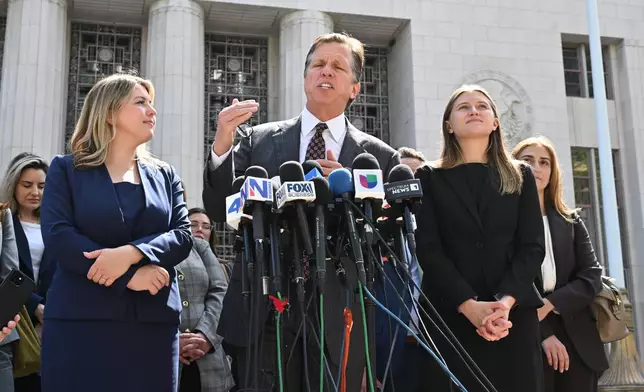Attorney Mark Lanier speaks during a news conference after the verdict in a landmark trial over whether social media platforms deliberately addict and harm children at Los Angeles Superior Court, Wednesday, March 25, 2026, in Los Angeles. (AP Photo/William Liang)