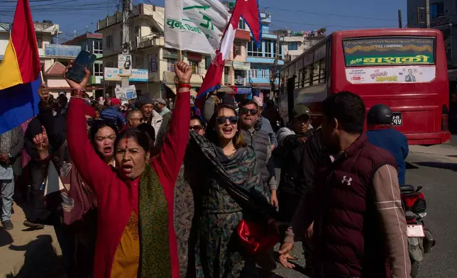 Supporter of Rastriya Prajatantra party gather to go to the election office to register their leader's candidacy for the general election to be held on March 5 in Kathmandu, Nepal, Tuesday, Jan. 20, 2026. (AP Photo/Niranjan Shrestha, File)