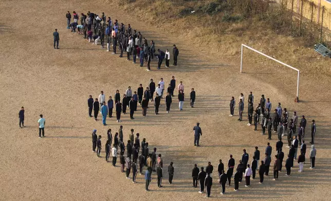 Newly recruited temporary police officers participate in training session ahead of the March 5 general election in Dhankuta, about 390 kilometers (242 miles) east of Kathmandu, Nepal, Wednesday, Feb. 4, 2026. (AP Photo/Niranjan Shrestha ,File)