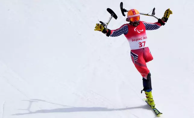 FILE - Patrick Halgren of the United States reacts after competing in the men's slalom, standing at the 2022 Winter Paralympics, Sunday, March 13, 2022, in the Yanqing district of Beijing. (AP Photo/Andy Wong, file)