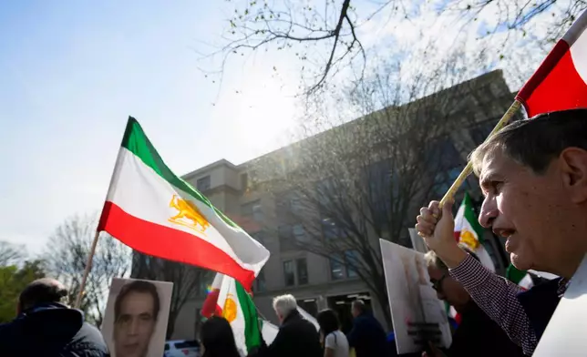 Glenn Torshizi, whose brothers were executed by the Iranian government, joins others in a picket line at the U.S. State Department, to highlight the executions in Karaj, Iran, of People's Mojahedin Organization of Iran members, Monday, March 30, 2026, in Washington. (AP Photo/Rod Lamkey, Jr.)