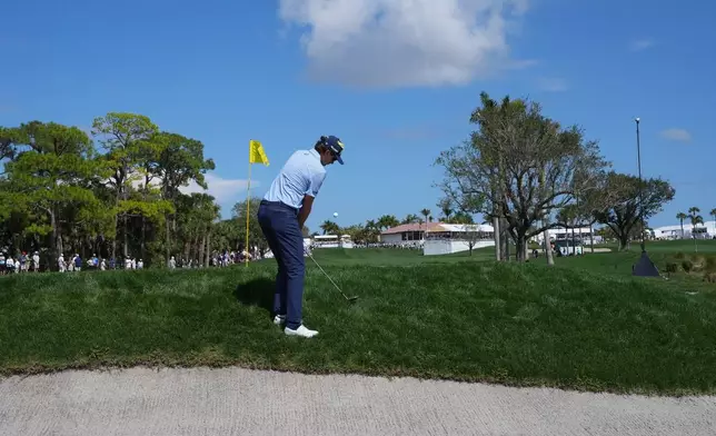 Nico Echavarria hits from the rough on the first green during the final round of the Cognizant Classic golf tournament, Sunday, March 1, 2026, in Palm Beach Gardens, Fla. (AP Photo/Marta Lavandier)