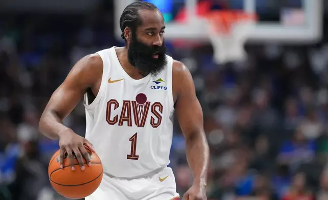 Cleveland Cavaliers guard James Harden works the floor against the Dallas Mavericks during the second half of an NBA basketball game Friday, March 13, 2026, in Dallas. (AP Photo/Julio Cortez)