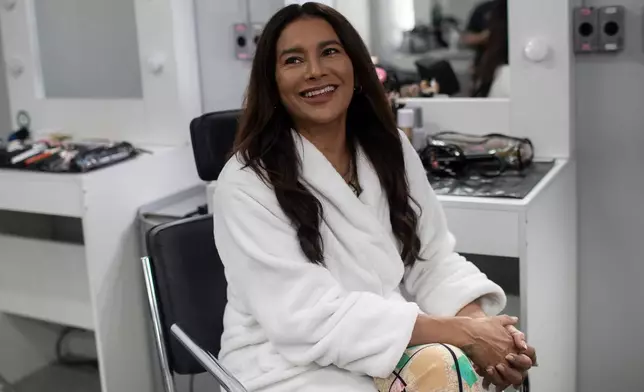 Brazilian actor Dira Paes smiles before an interview at the TV Globo studio in Rio de Janeiro, Thursday, March 12, 2026. (AP Photo/Bruna Prado)