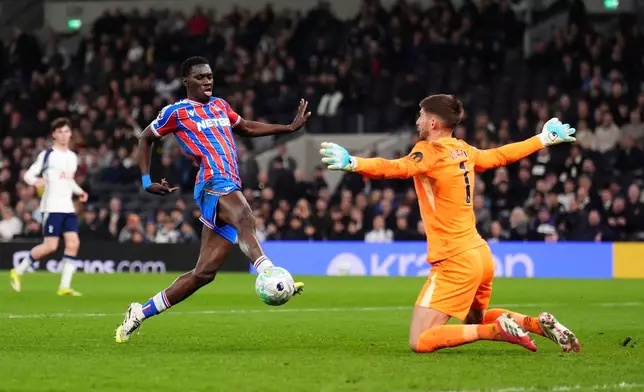 Crystal Palace's Ismaila Sarr scores during the English Premier League soccer match between Tottenham Hotspur and Crystal Palace in London, Thursday March 5, 2026. (John Walton/PA via AP)