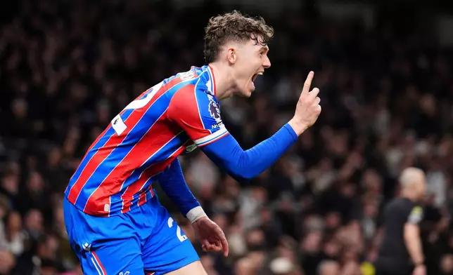 Crystal Palace's Jorgen Strand Larsen celebrates scoring during the English Premier League soccer match between Tottenham Hotspur and Crystal Palace in London, Thursday March 5, 2026. (John Walton/PA via AP)