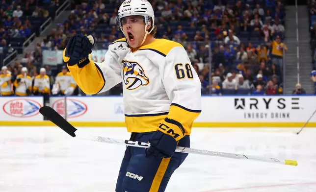 Nashville Predators left wing Zachary L'heureux (68) celebrates his goal during the second period of an NHL hockey game against the Buffalo Sabres, Saturday, March 7, 2026, in Buffalo, N.Y. (AP Photo/Jeffrey T. Barnes)