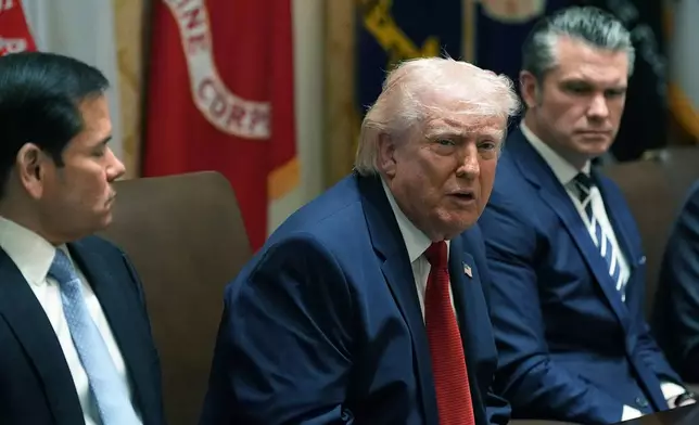 President Donald Trump speaks during a Cabinet meeting at the White House, Thursday, March 26, 2026, in Washington. From left are Secretary of State Marco Rubio, Trump and Secretary of Defense Pete Hegseth. (AP Photo/Alex Brandon)