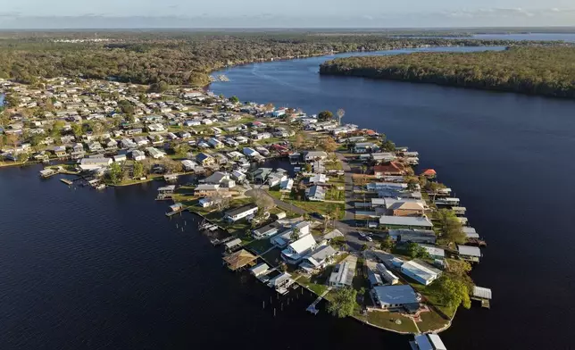 The town of Welaka on the St. Johns River is visible Thursday, March 5, 2026, in Welaka, Fla. (AP Photo/Daniel Kozin)