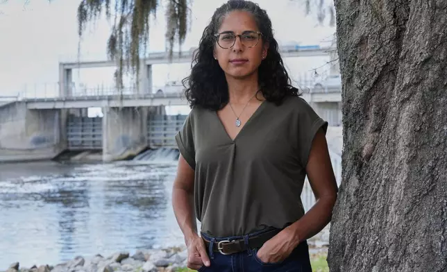 Nina Bhattacharyya, executive director of Florida Defenders of the Environment, stands near the Kirkpatrick Dam on Wednesday, March 4, 2026, in Palatka, Fla. (AP Photo/Marta Lavandier)