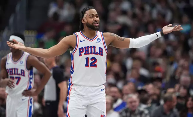Philadelphia 76ers forward Trendon Watford argues after he was called for a foul in the first half of an NBA basketball game against the Denver Nuggets Tuesday, March 17, 2026, in Denver. (AP Photo/David Zalubowski)