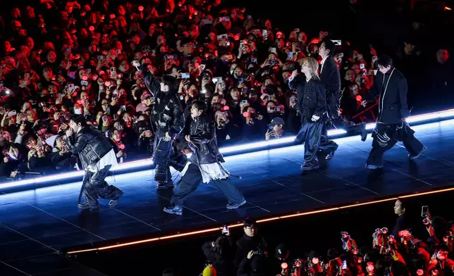 Kpop group BTS perform during 'BTS The Comeback Live Arirang' concert in central Seoul, South Korea, March 21, 2026. (Kim Hong-Ji/Pool Photo via AP)