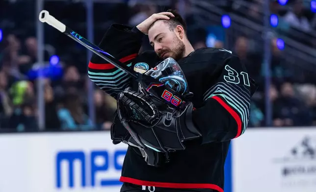 Seattle Kraken goaltender Philipp Grubauer reacts during an NHL hockey game against the St. Louis Blues, Wednesday, March 4, 2026, in Seattle. (AP Photo/Maddy Grassy)