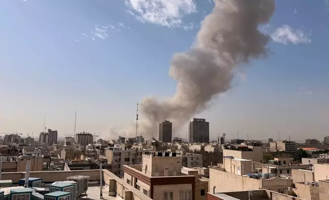 Smoke rises on the skyline after an explosion in Tehran, Iran, Saturday, Feb. 28, 2026.(AP Photo)