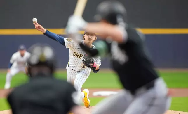 Milwaukee Brewers pitcher Brandon Sproat throws during the first inning of a baseball game against the Chicago White Sox, Sunday, March 29, 2026, in Milwaukee. (AP Photo/Kayla Wolf)