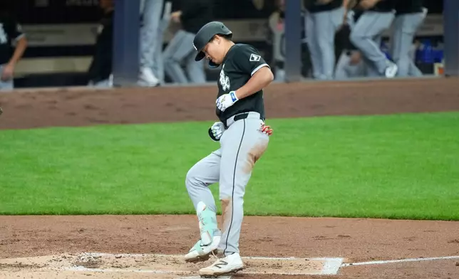 Chicago White Sox's Munetaka Murakami scores on a home run during the second inning of a baseball game against the Milwaukee Brewers, Sunday, March 29, 2026, in Milwaukee. (AP Photo/Kayla Wolf)