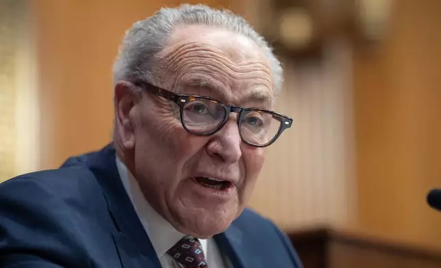 Prior to votes, Senate Minority Leader Chuck Schumer, D-N.Y., makes a statement to a forum on climate change and the consequences for home insurance, grocery prices, and health care costs, at the Capitol in Washington, Thursday, March 26, 2026. (AP Photo/J. Scott Applewhite)