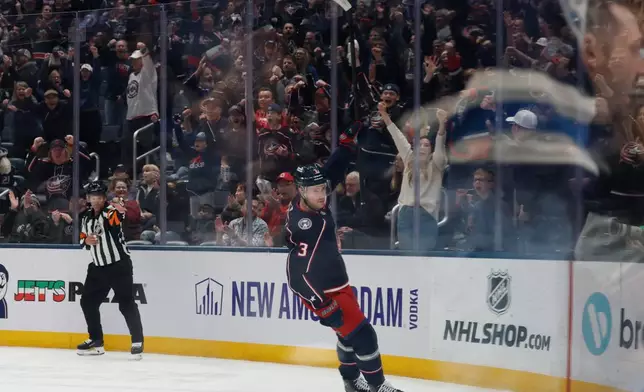 Columbus Blue Jackets' Charlie Coyle celebrates his goal against the Boston Bruins during the first period of an NHL hockey game, Sunday, March 29, 2026, in Columbus, Ohio. (AP Photo/Jay LaPrete)