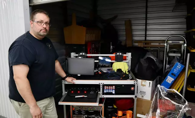 Digital imaging technician Chris Ratledge stands next to his film equipment inside a storage unit in Peachtree City, Ga., Thursday, March 5, 2026. (AP Photo/R.J. Rico)