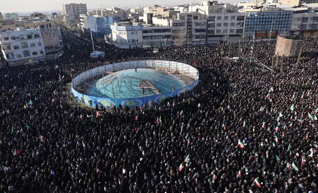 Government supporters gather in mourning after state TV officially announced the death of Iranian Supreme Leader Ayatollah Ali Khamenei, in Tehran, Iran, Sunday, March 1, 2026. (AP Photo/Vahid Salemi)
