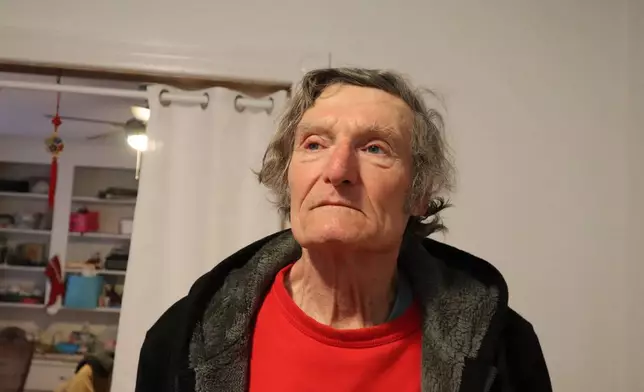 Claude Leboeuf, a clergy abuse survivor and advocate, poses at his home in Providence, R.I., Thursday, March 5, 2026, after a report by the Rhode Island attorney general detailed decades of abuse within the Catholic Diocese of Providence. (AP Photo/Leah Willingham)