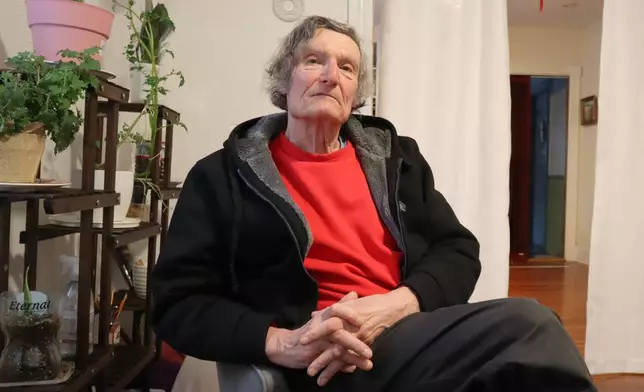 Claude Leboeuf, a clergy abuse survivor and advocate, sits for a portrait at his home in Providence, R.I., Thursday, March 5, 2026, after a report by the Rhode Island attorney general detailed decades of abuse within the Catholic Diocese of Providence. (AP Photo/Leah Willingham)