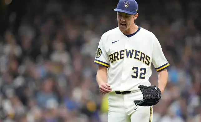 Milwaukee Brewers pitcher Jacob Misiorowski reacts after striking out Chicago White Sox's Andrew Benintendi during the first inning of an opening-day baseball game, Thursday, March 26, 2026, in Milwaukee. (AP Photo/Kayla Wolf)