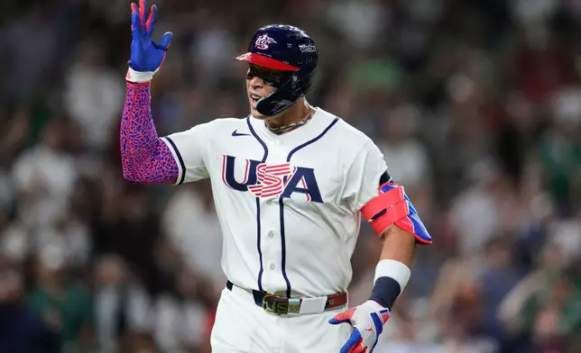 United States' Aaron Judge celebrates after hitting a two-run home run during the third inning of a World Baseball Classic game against Mexico, Monday, March 9, 2026, in Houston. (AP Photo/Ashley Landis)