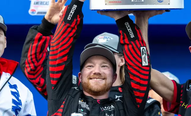 23XI Racing's Tyler Reddick celebrates after winning a NASCAR Cup Series auto race in Austin, Texas, Sunday, March 1, 2026. (AP Photo/Stephen Spillman)