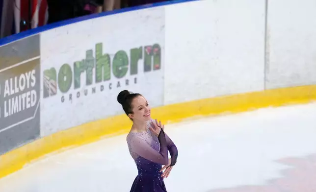 Stef Reid, a former Paralympic athlete who now does figure skating, competes in the British Adult Figure Skating Championships in Sheffield, England, Friday, Feb. 6, 2026. (AP Photo/Jon Super)