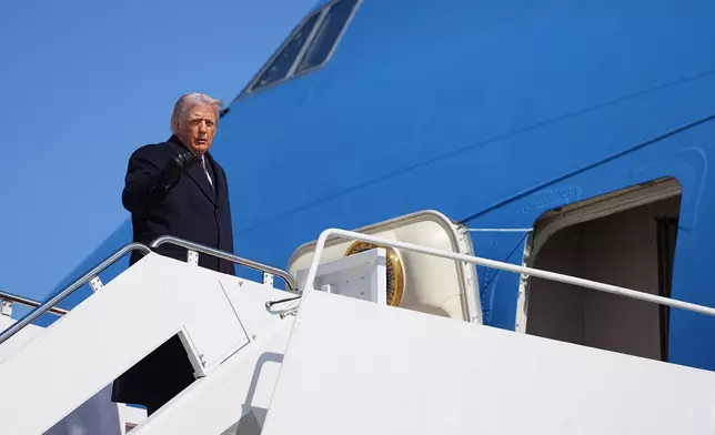 President Donald Trump boards Air Force One at Joint Base Andrews, Md., Friday, Feb. 27, 2026, en route Corpus Christi, Texas. (AP Photo/Matt Rourke)