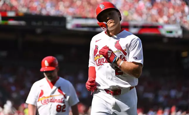 St. Louis Cardinals' JJ Wetherholt reacts after an at bat of his MLB Debut during the first inning an opening-day baseball game against the Tampa Bay Rays, Thursday, March 26, 2026, in St. Louis. (AP Photo/Jeff Le)