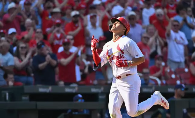 St. Louis Cardinals' JJ Wetherholt reacts after hitting a homer against the Tampa Bay Rays during the third inning of an opening-day baseball game, Thursday, March 26, 2026, in St. Louis. (AP Photo/Jeff Le)