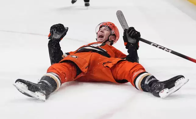 Anaheim Ducks right wing Beckett Sennecke celebrates his goal during the first period of an NHL hockey game against the New York Islanders Wednesday, March 4, 2026, in Anaheim, Calif. (AP Photo/Gregory Bull)