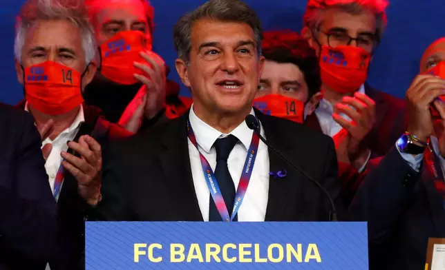 FILE - Joan Laporta celebrates his victory after elections at the Camp Nou stadium in Barcelona, Spain, on March 7, 2021. (AP Photo/Joan Monfort, File)