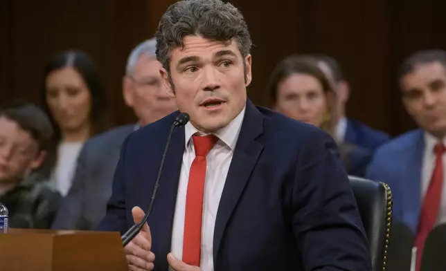 FILE - Joseph Kent appears before a Senate Committee on Intelligence hearing for his pending confirmation to be director of the National Counterterrorism Center, on Capitol Hill, April 9, 2025, in Washington. (AP Photo/Rod Lamkey, Jr., File)