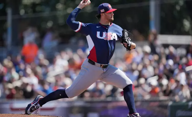 United States starting pitcher Paul Skenes throws against the San Francisco Giants during the first inning of an exhibition baseball game Tuesday, March 3, 2026, in Scottsdale, Ariz. (AP Photo/Ross D. Franklin)