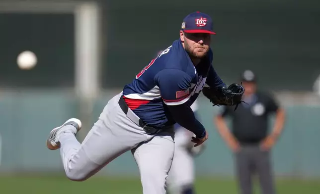 United States pitcher David Bednar throws against the San Francisco Giants during the seventh inning of an exhibition baseball game Tuesday, March 3, 2026, in Scottsdale, Ariz. (AP Photo/Ross D. Franklin)