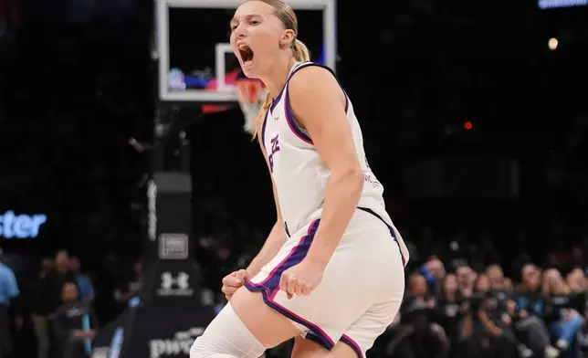 Breeze BC guard Paige Bueckers (5) celebrates after scoring during the first half of a semifinal an Unrivaled 3-on-3 basketball game against Mist BC, Monday, March 2, 2026, in New York. (AP Photo/Frank Franklin II)