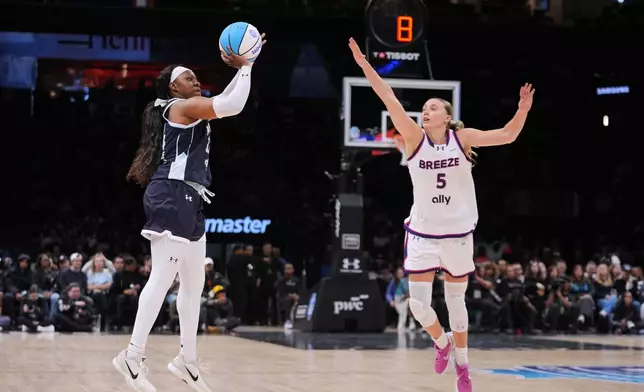 Mist BC wing Arike Ogunbowale (24) shoots over Breeze BC guard Paige Bueckers (5) during the second half of a semifinal in an Unrivaled 3-on-3 basketball game, Monday, March 2, 2026, in New York. (AP Photo/Frank Franklin II)