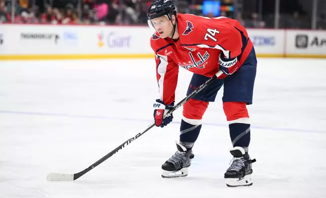 FILE -Washington Capitals defenseman John Carlson (74) in action during the first period of an NHL hockey game against the Nashville Predators, Feb. 5, 2026, in Washington. (AP Photo/Nick Wass, File)